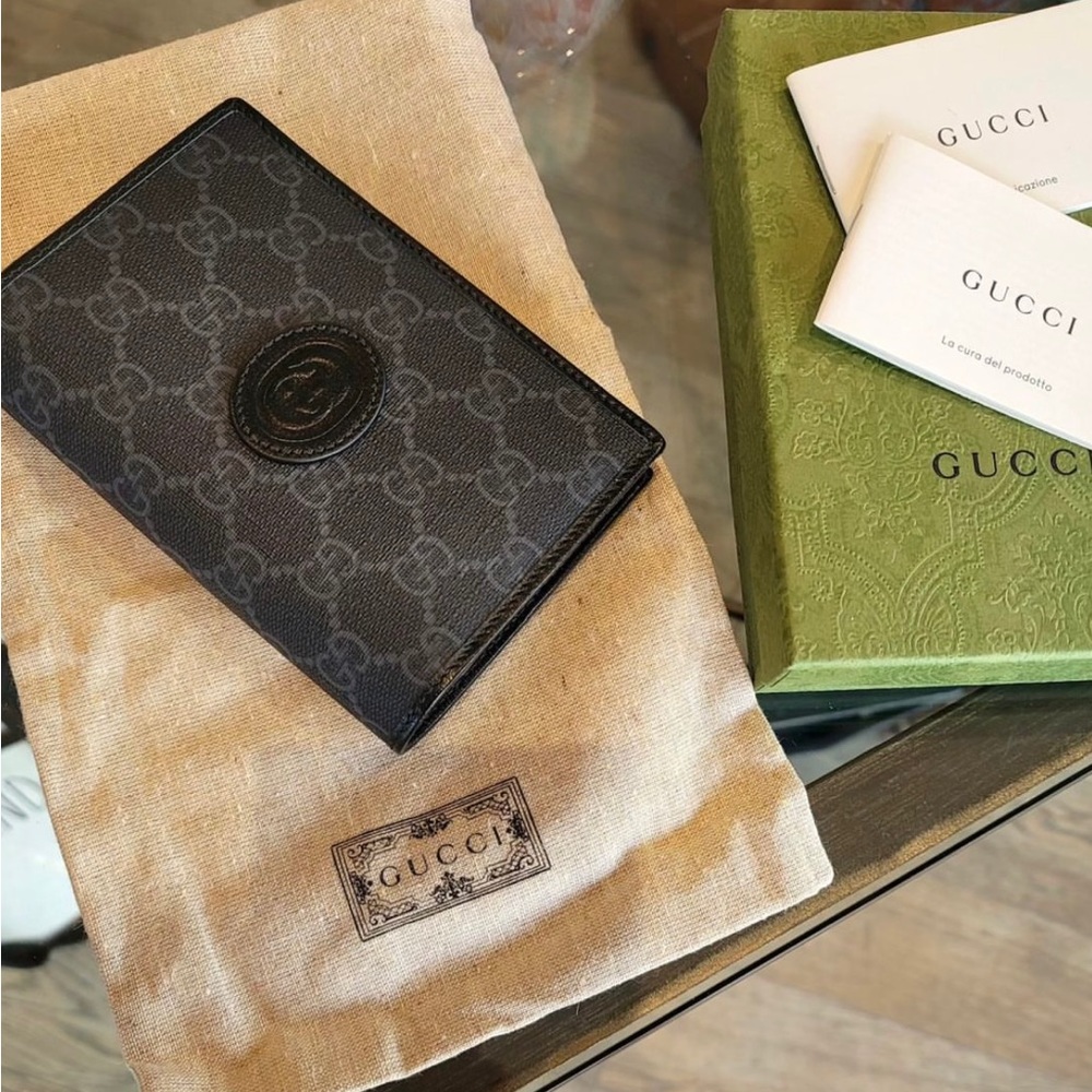 Gucci black and grey passport wallet, brand new , in box.